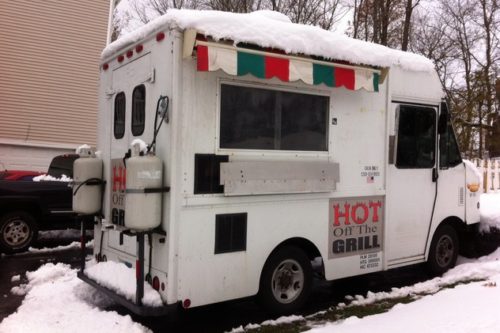 Norwalk Officer Pat English is donating use of his food truck, Hot Off The Grill, for Hurricane Sandy relief efforts in Queens. Photo Credit: Courtesy of Ashley Gonzalez
