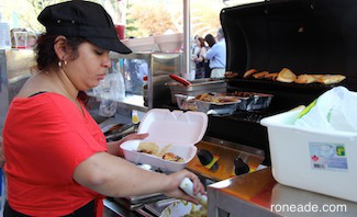 Left, part owner Irene Cummings serves Latino fare at ROYI Fruta food cart.