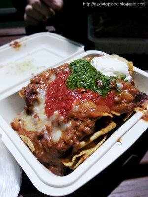 Organic Nachos (wagyu chilli con carne, cheese, tomato and chimmichurri) $12