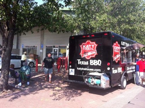 Katy Trail Ice House food truck with the words "Texas BBQ" parked outside Pecan Lodge at the Dallas Farmers Market. Chad Houser/Twitter