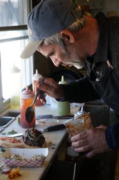 "Chico" Mendonca takes his time making each dish perfect.