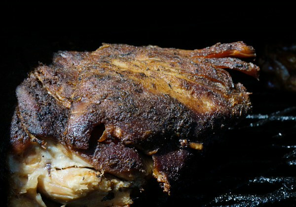 Pork smoking on the rotisserie 