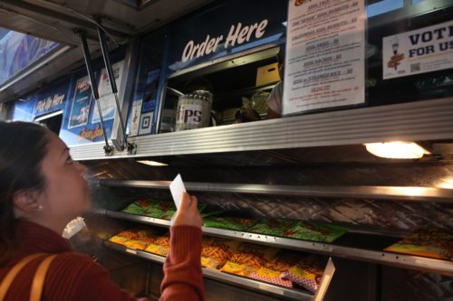 Gemma Paulo gets ready to pay for her order at Senor Sisig in San Francisco. (Photo: San Francisco Chronicle)