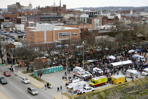 Thousands of people swarm North Pershing Avenue during the second Foodstruck event in April 2014. This Sunday, Foodstruck returns to York with more food trucks, more space and more hours to get all that eating in. It will run from 11 a.m. to 6 p.m. at Penn Park in York. (File — flipside)
