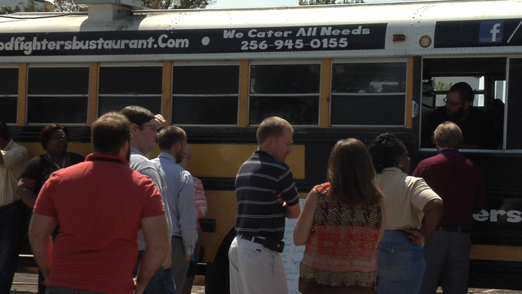 Poeple line up for lunch at the Food truck Fest at Redstone Arsenal
