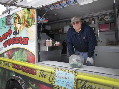 Lou DiMarco of Chili operates Wraps on Wheels food truck, which will participate in the upcoming food rodeo at Spencerport High School. (Photo: ANNETTE LEIN/staff file photo )