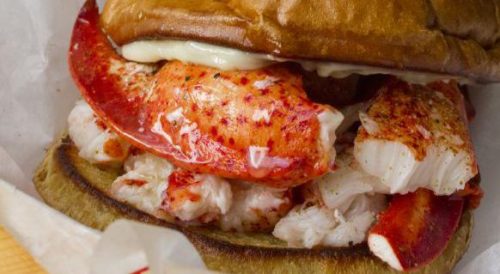 The Happy Lobster Roll ($15) features fresh Maine lobster and mayo on a buttered hamburger bun. Photo Submitted