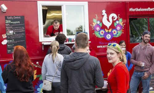Customers gather around Betty Crockski at the Food Truck Rodeo outside the Buffalo History Museum. (Don Nieman/Special to The News)