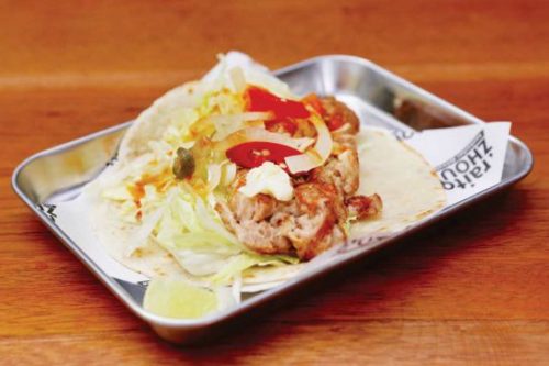The tacos from Kaifun come food truck style.  Daniel Nass