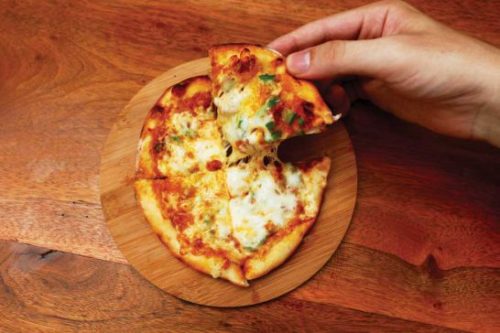 Kaifun’s mini pizzas are tasty but can’t compare with Phnom Penh’s best.  Daniel Nass