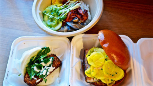 A selection of dishes, including steamed,  left, and baked, right, bao from the Chairman,  a new restaurant in the downtown Arts District.   (Eddie Lin / For The Times)