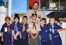 Delray, FL: Cub Scouts serve seniors at food truck event