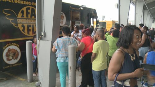 Food Truck, Craft Beer Festival at the  State Farmer's Markert.  Here 'Too Fat To Fly"  has customers lined  up.   This year the festival will be held at  the Fairgrounds to give more  space and help with traffic. 