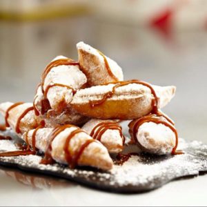 French beignets, a dessert served at local French chef Alain Treville's food truck, Et Voila. // Submitted Photo.